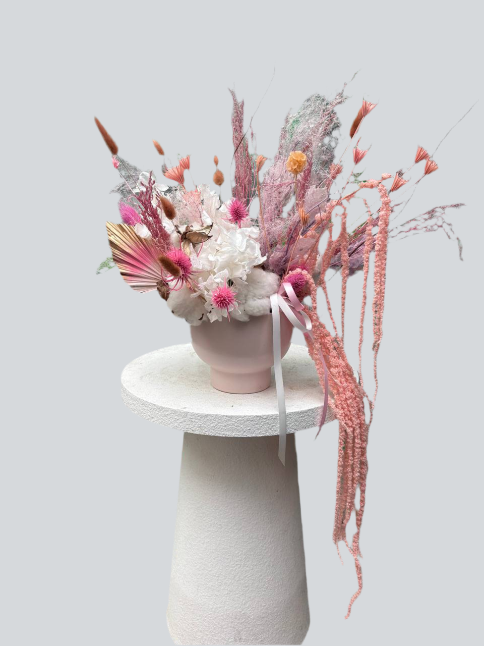 Dried and artificial flower arrangements